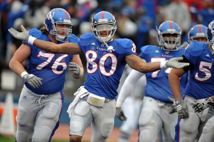 Oct 10, 2009; Lawrence, KS, USA; Kansas Jayhawks wide receiver Dezmon Briscoe (80) celebrates after catching a touchdown pass against the Iowa State Cyclones in the second half at Memorial Stadium. Kansas won the game 41-36. Mandatory Credit: John Rieger-USA TODAY Sports